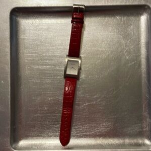 Watch with red leather band